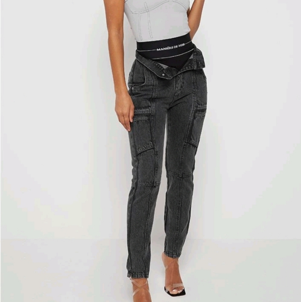 Foldover waistband jeans with zipper in the back.